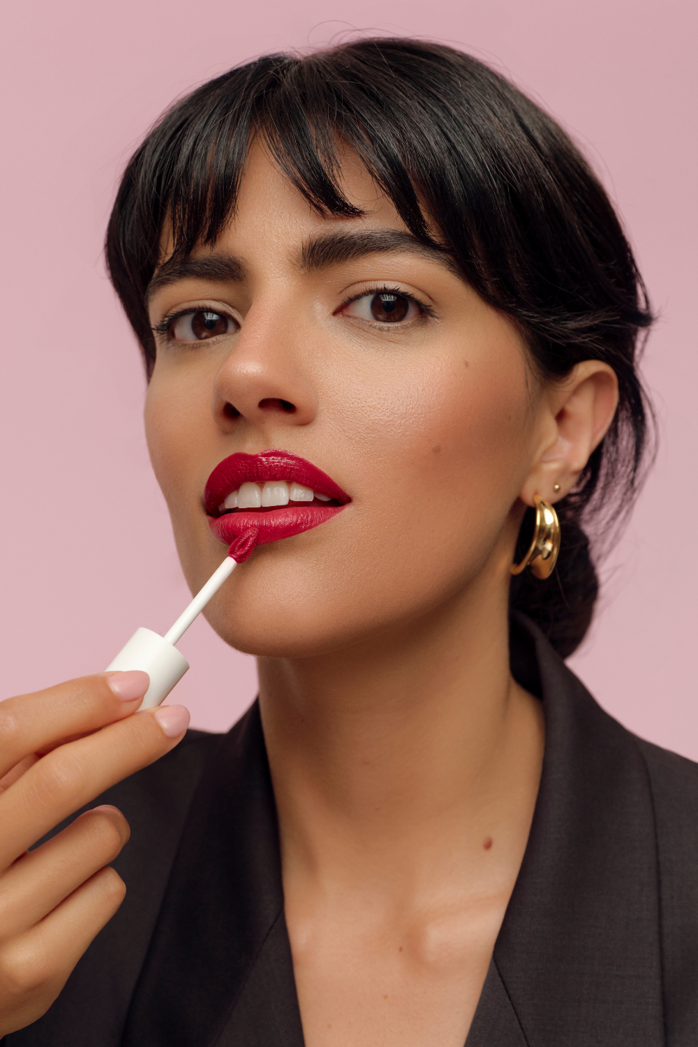 lavera Pure Satin Liquid Lipstick -Poppy Red 01- during application
